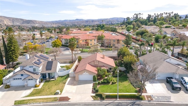 bird's eye view with a residential view and a mountain view