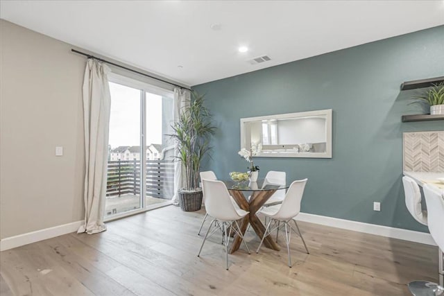 dining room featuring light wood-type flooring