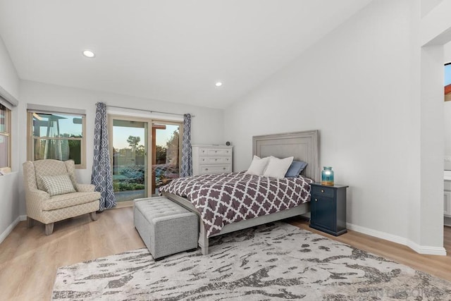 bedroom featuring lofted ceiling, light hardwood / wood-style flooring, and access to outside