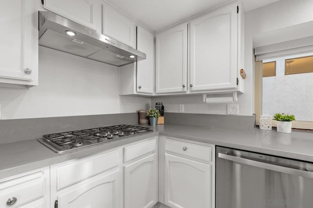 kitchen featuring white cabinets