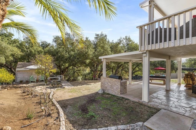 view of yard featuring a deck