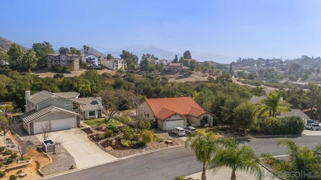 drone / aerial view featuring a mountain view