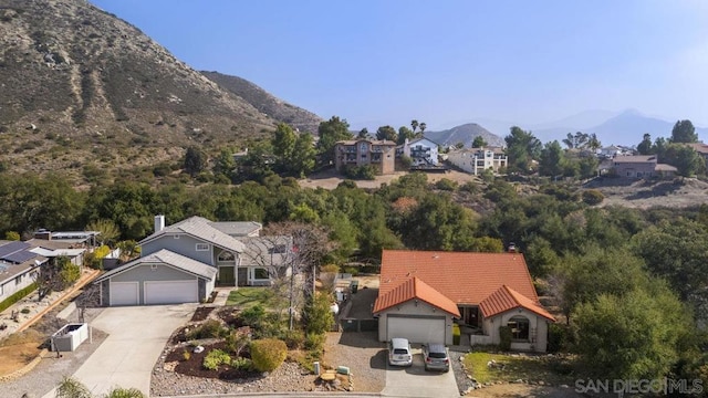 drone / aerial view featuring a mountain view