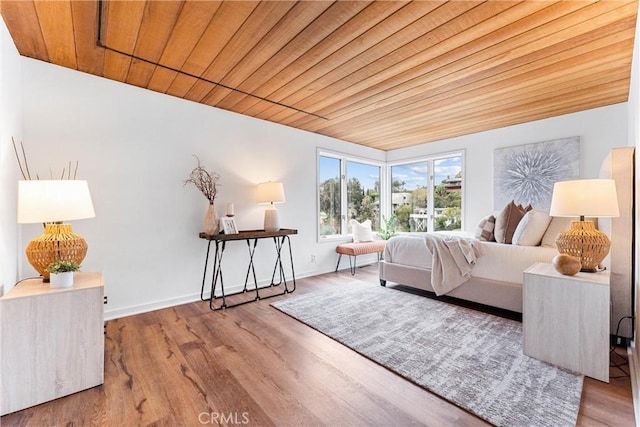 bedroom featuring wood ceiling and hardwood / wood-style floors