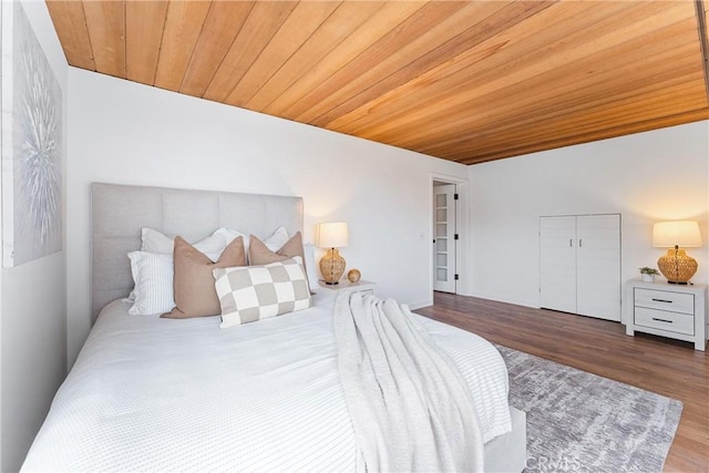 bedroom featuring wood ceiling and wood-type flooring