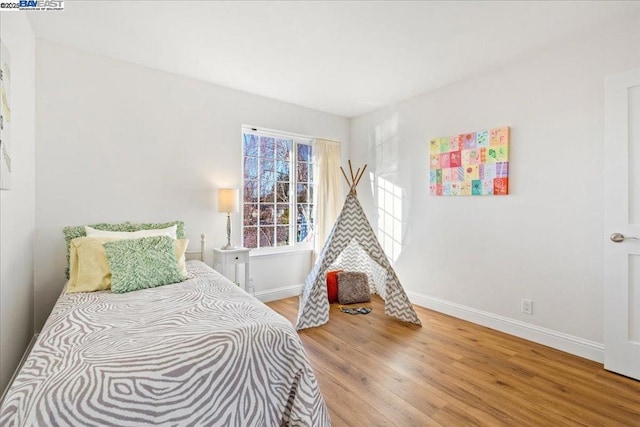 bedroom featuring hardwood / wood-style floors