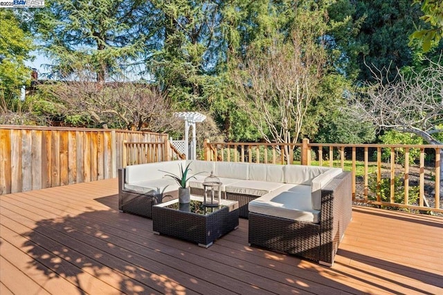 deck with an outdoor hangout area