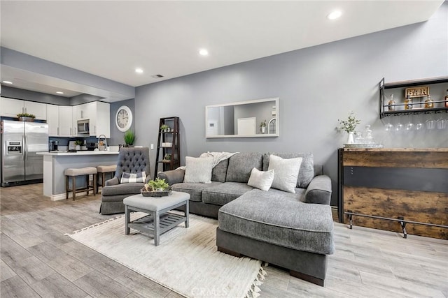 living room featuring light hardwood / wood-style flooring