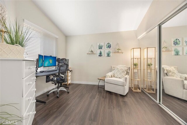 home office with baseboards and dark wood-style flooring