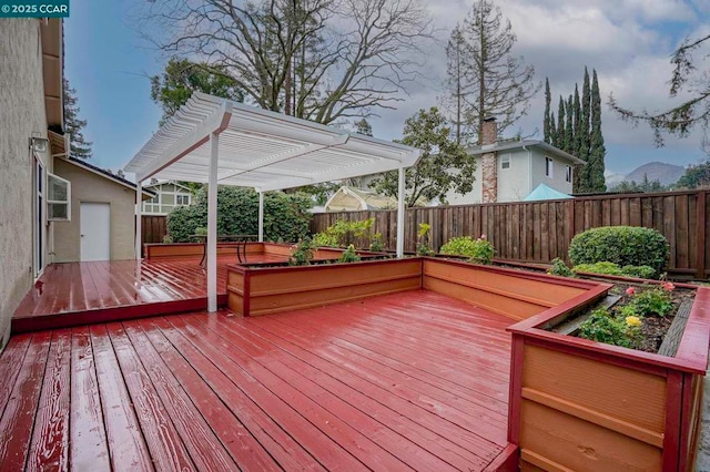 wooden terrace featuring a pergola