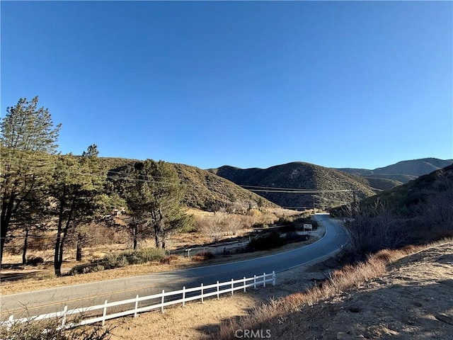 property view of mountains featuring a rural view