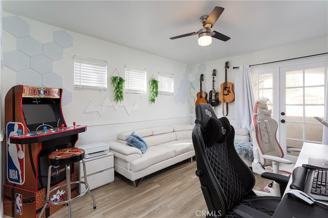 office space with light hardwood / wood-style flooring, french doors, and ceiling fan