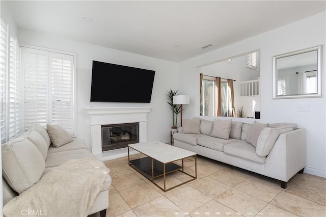 living room with light tile patterned floors