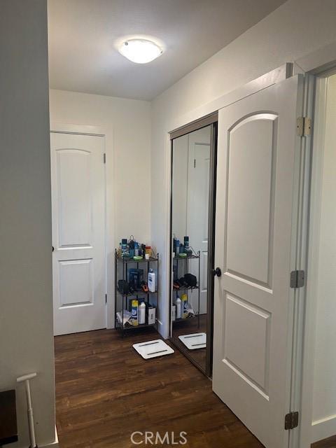 hallway featuring dark hardwood / wood-style floors