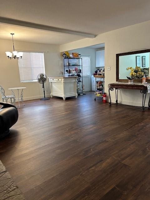 interior space featuring beamed ceiling, dark hardwood / wood-style floors, and a chandelier