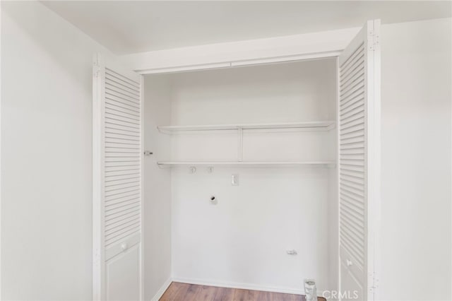 washroom with light wood-type flooring