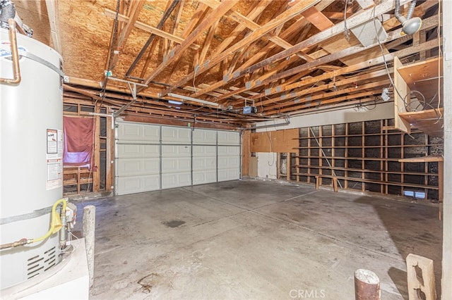 garage featuring secured water heater