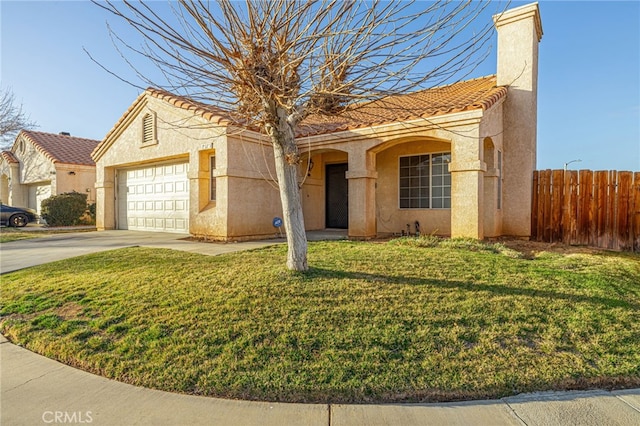 view of front facade featuring a garage and a front lawn