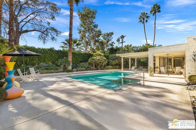 view of pool featuring a pergola and a patio