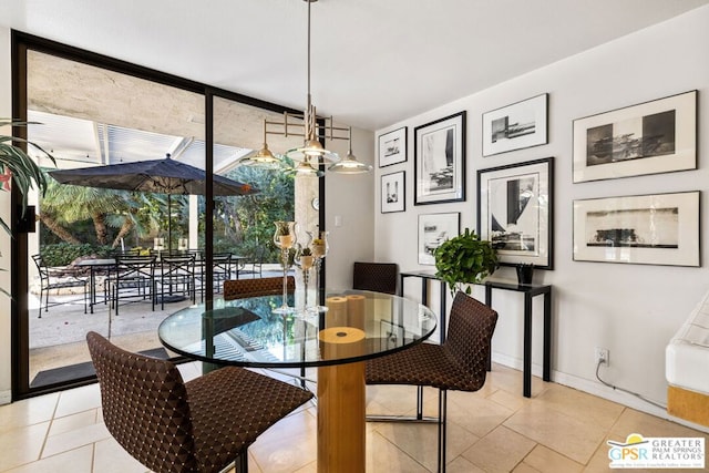 tiled dining space with floor to ceiling windows