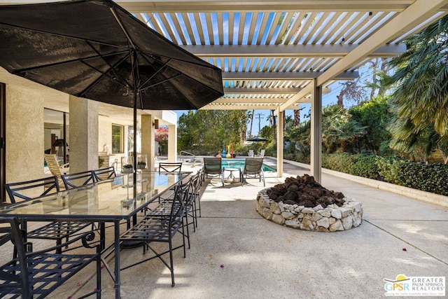 view of patio / terrace featuring a pergola and an outdoor fire pit