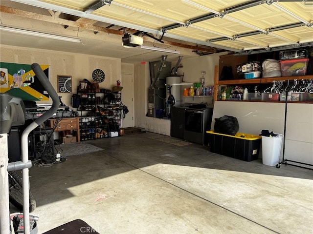 garage featuring a garage door opener and water heater