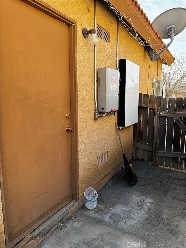 3319 Kellie Ave, Rosamond, CA 93560 - property entrance with stucco siding and crawl space