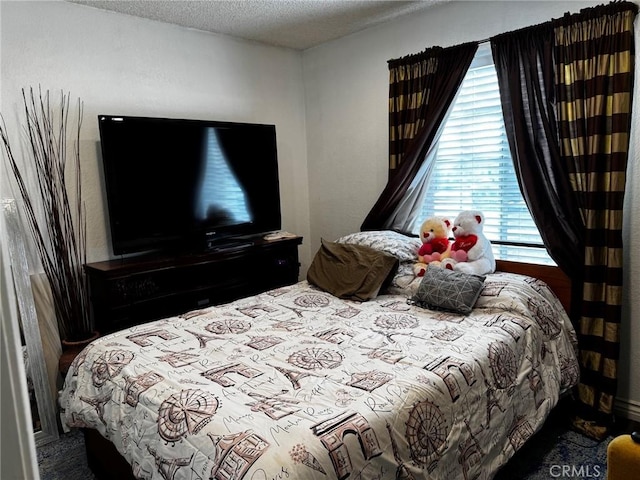 bedroom with a textured ceiling