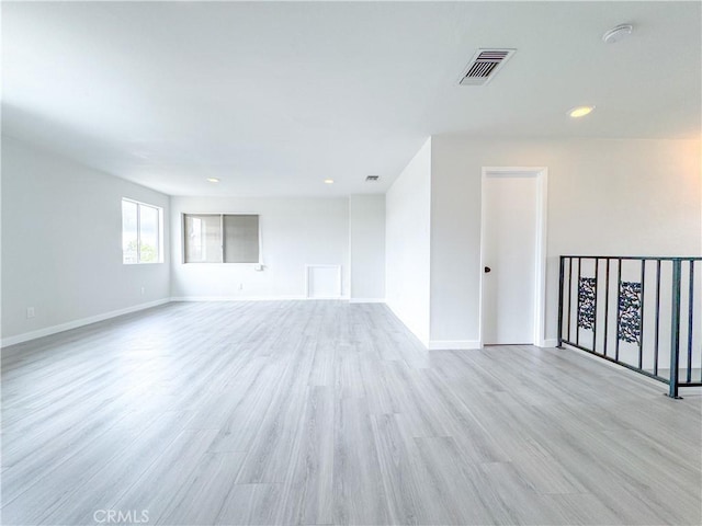 unfurnished room featuring light wood-type flooring