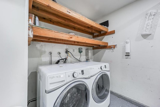 laundry room featuring washing machine and dryer