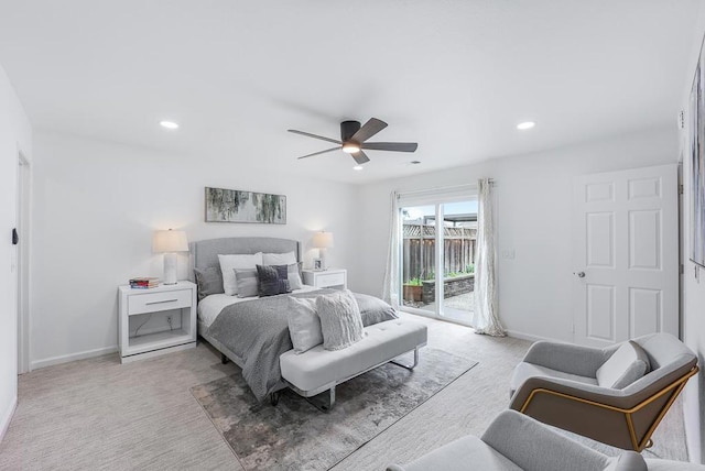 carpeted bedroom featuring access to exterior and ceiling fan