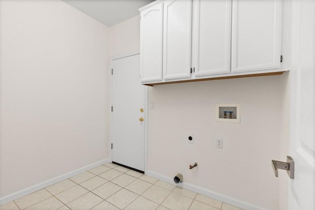 laundry room with cabinets, light tile patterned flooring, washer hookup, and hookup for an electric dryer