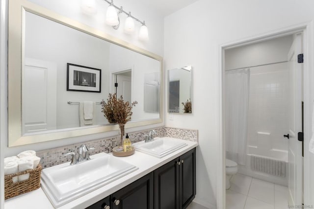 full bathroom featuring decorative backsplash, vanity, toilet, tile patterned floors, and shower / bath combo with shower curtain