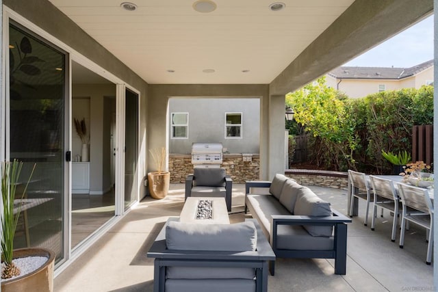 view of patio with an outdoor kitchen and an outdoor hangout area