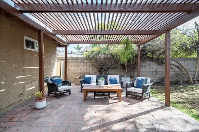 view of patio / terrace with an outdoor living space and a pergola