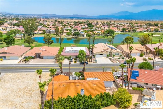 aerial view with a water and mountain view