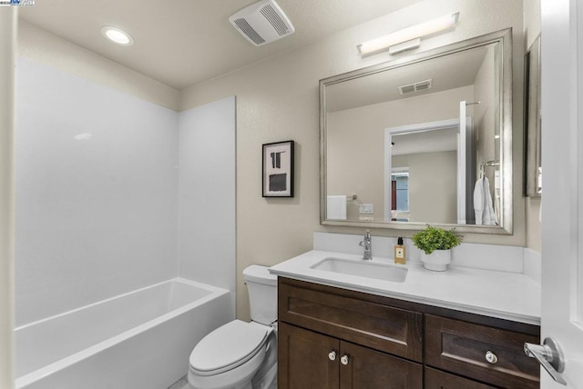 full bathroom with vanity, shower / bathing tub combination, and toilet