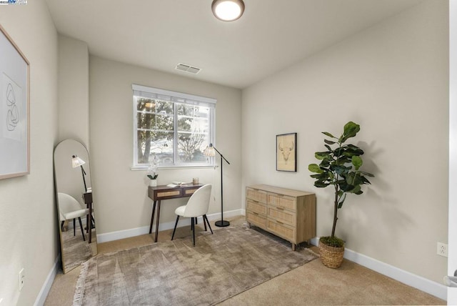 home office with carpet flooring