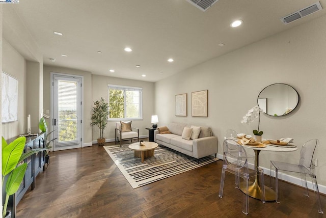 living room featuring dark hardwood / wood-style flooring