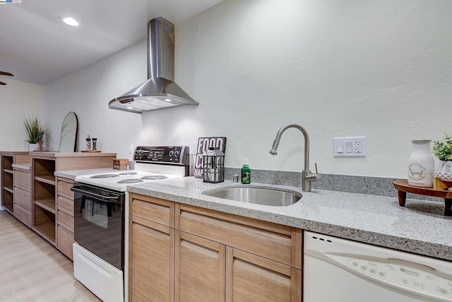 kitchen featuring wall chimney exhaust hood, sink, light stone counters, electric range, and white dishwasher