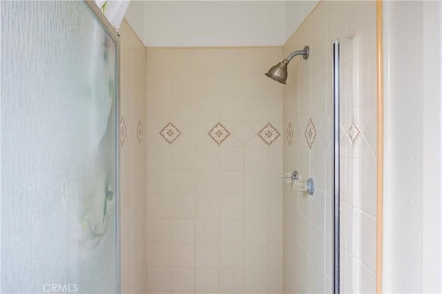 bathroom featuring walk in shower