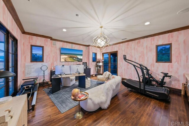 living room featuring baseboards, recessed lighting, wood-type flooring, and crown molding