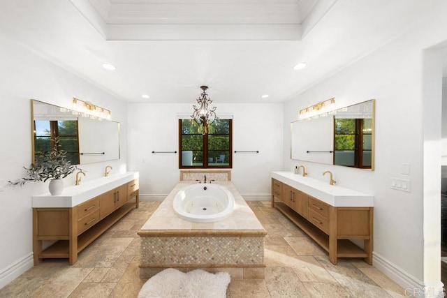 bathroom with baseboards, recessed lighting, a wealth of natural light, and stone tile floors