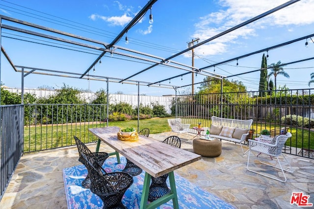 view of patio with an outdoor living space and a pergola