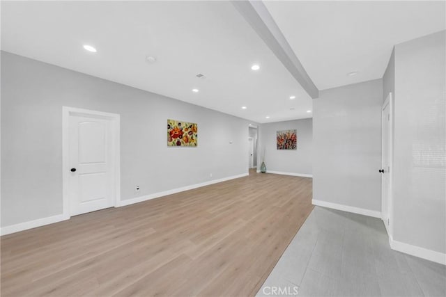 unfurnished living room featuring light hardwood / wood-style floors