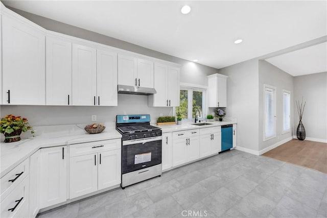 kitchen with stainless steel appliances, sink, and white cabinets