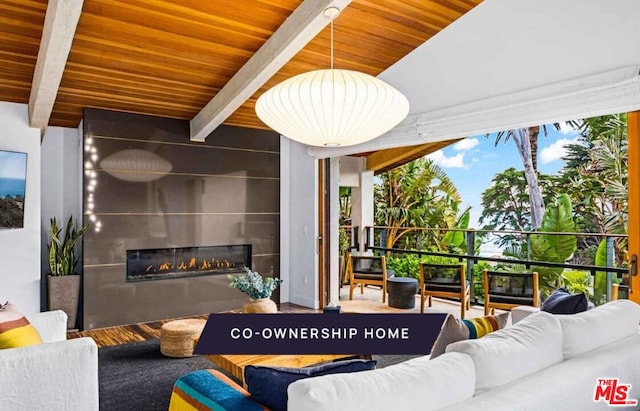 living room with a wall of windows, beam ceiling, and wooden ceiling