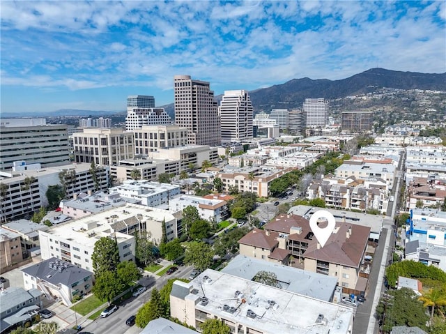 bird's eye view with a view of city and a mountain view