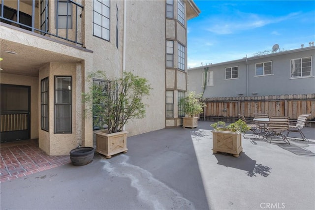 view of patio with fence