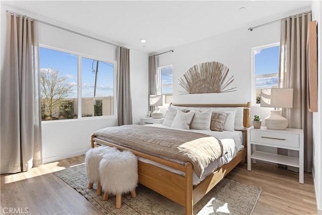 bedroom featuring light hardwood / wood-style floors